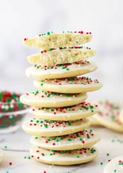 A stack of iced Cakey Christmas Cookies.