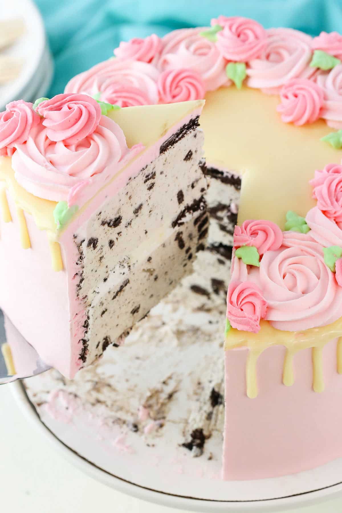 A slice of Carvel Cake being lifted on a cake server