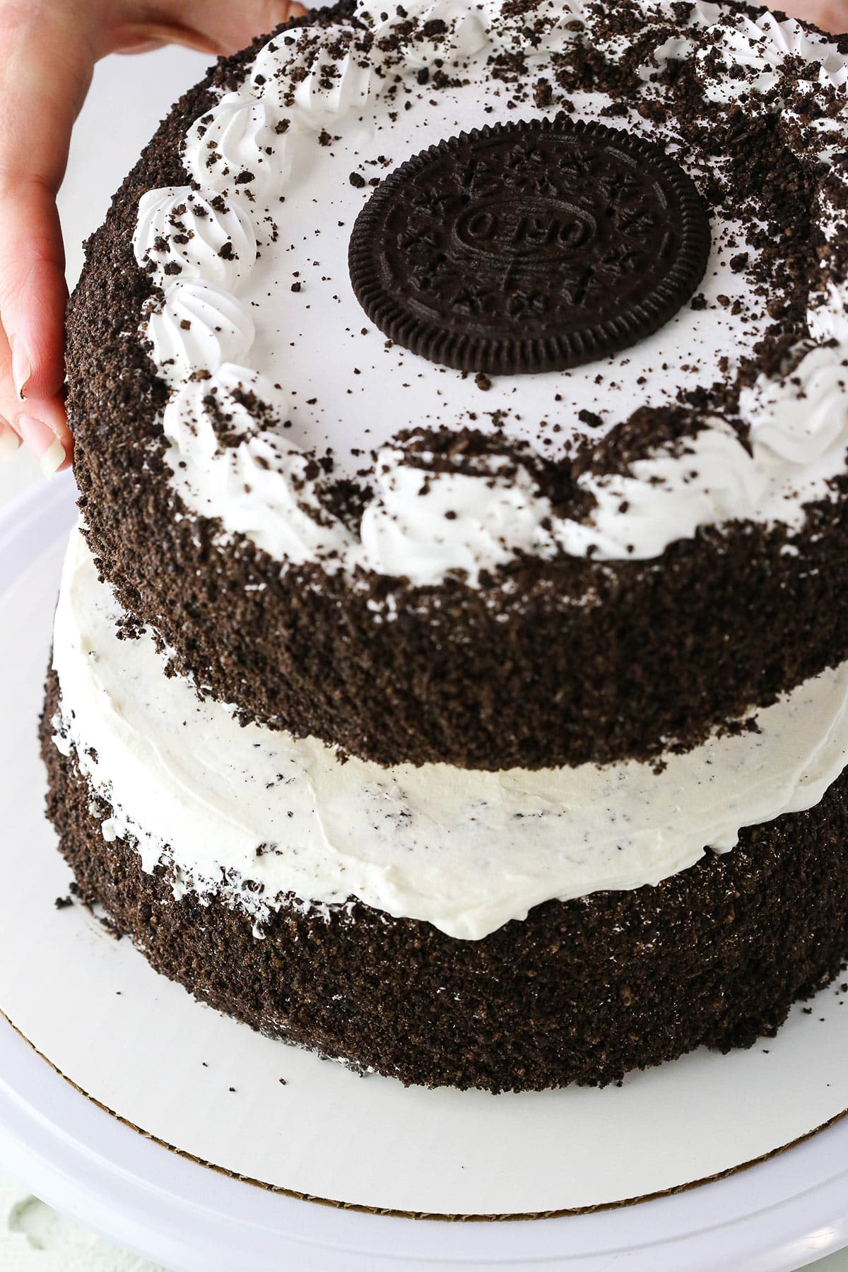 Stacking an Oreo Ice Cream Cake on top of another Oreo Ice Cream Cake