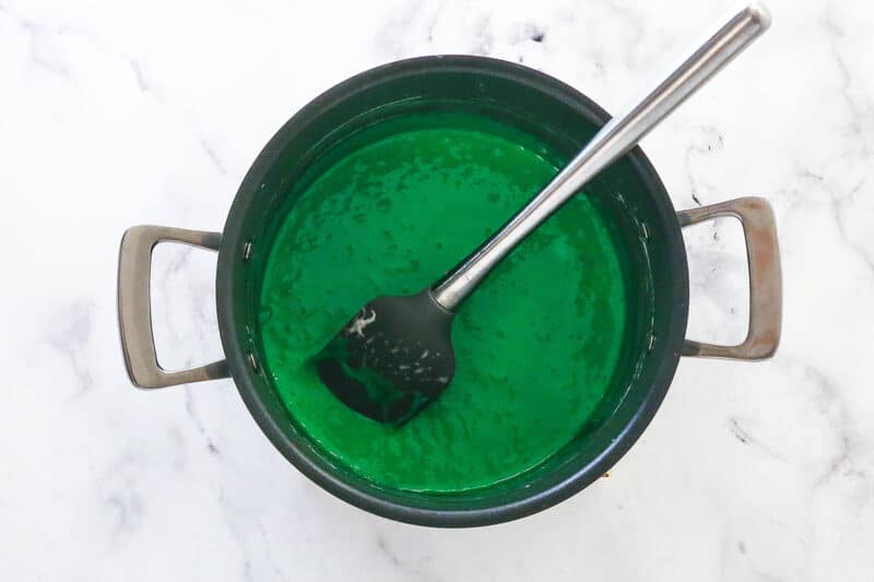 Food coloring added to marshmallows in a pan