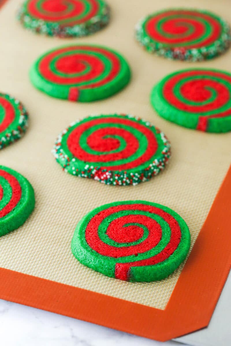 Baked pinwheel Christmas cookies on a baking sheet