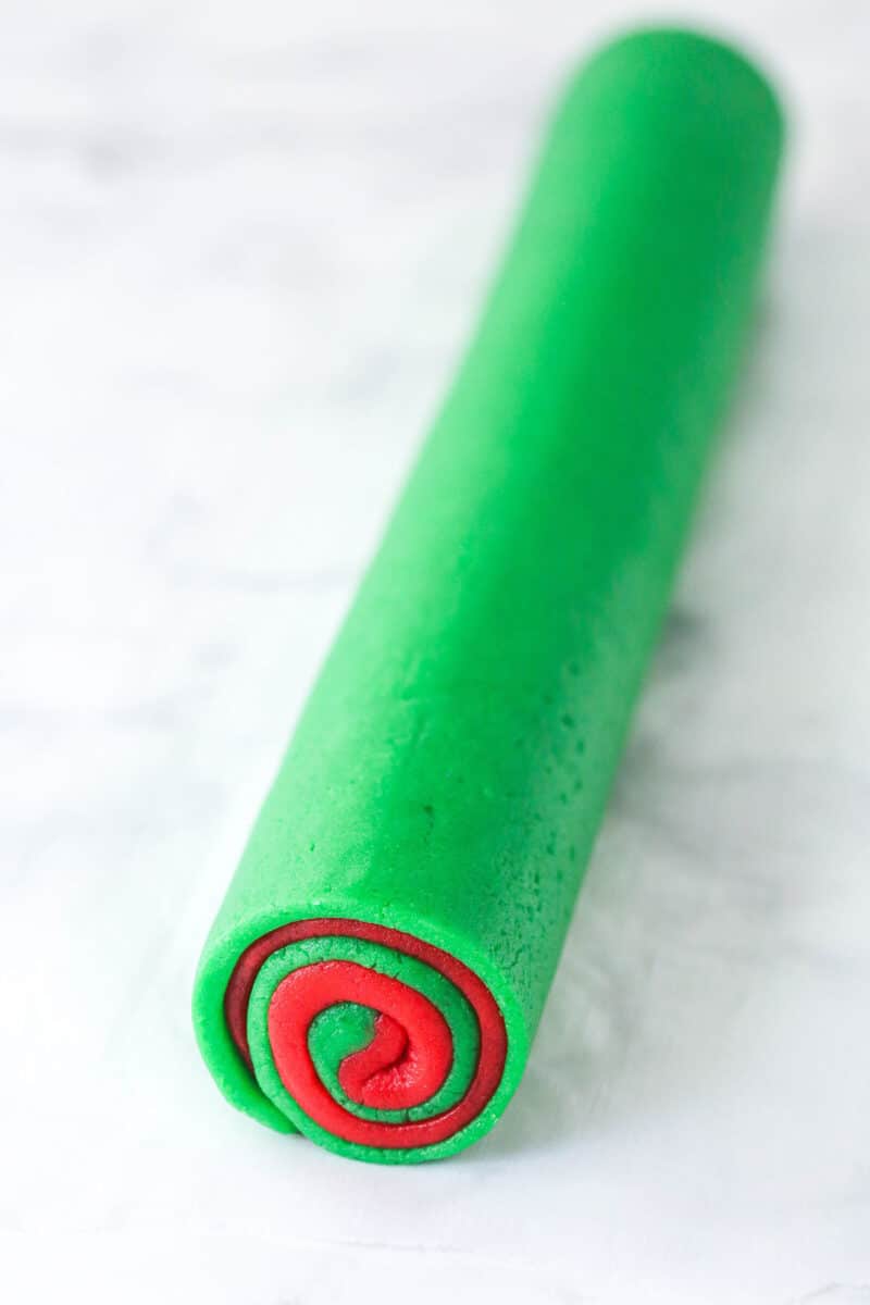 A log of red and green cookie dough