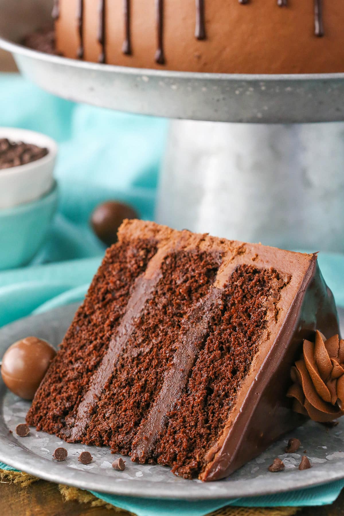 A slice of Drunken Chocolate Truffle Cake on a gray plate