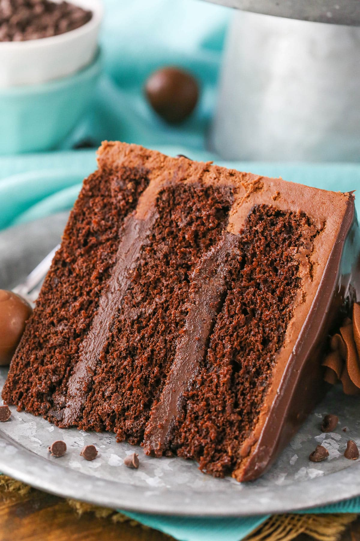 A slice of Drunken Chocolate Truffle Cake on a gray plate