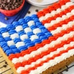 A full Flag Chocolate Chip Cookie Cake on a cooling rack