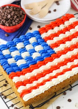 A full Flag Chocolate Chip Cookie Cake on a cooling rack