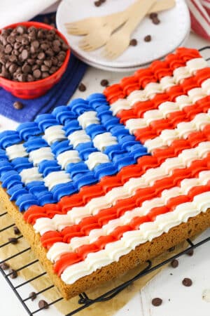 A full Flag Chocolate Chip Cookie Cake on a cooling rack