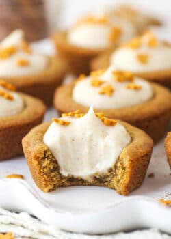 Close up of a Gingerbread Cheesecake Cookie Cup with a bite removed to show interior.