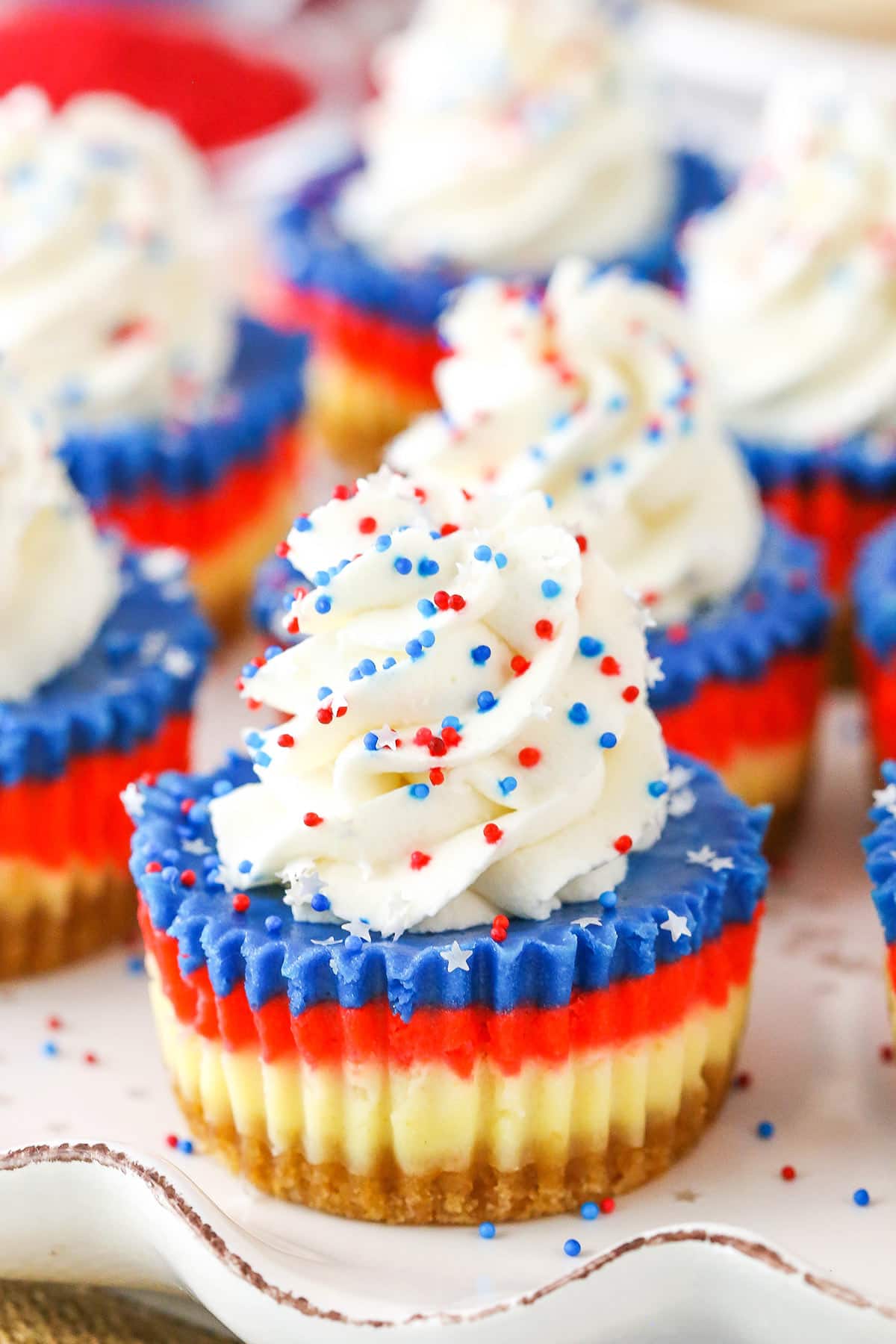 Red White and Blue Mini Cheesecakes on a white platter