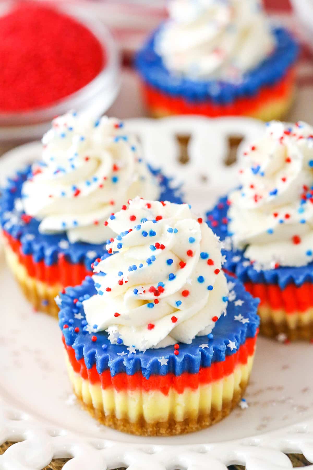 Red White and Blue Mini Cheesecakes on a white plate