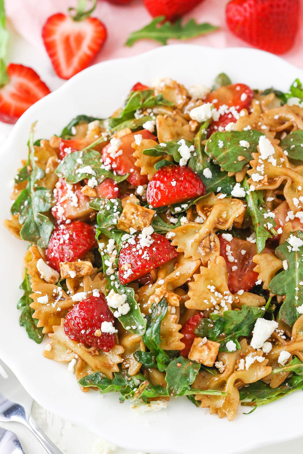 Overhead view of Strawberry Feta Balsamic Pasta Salad on a white plate