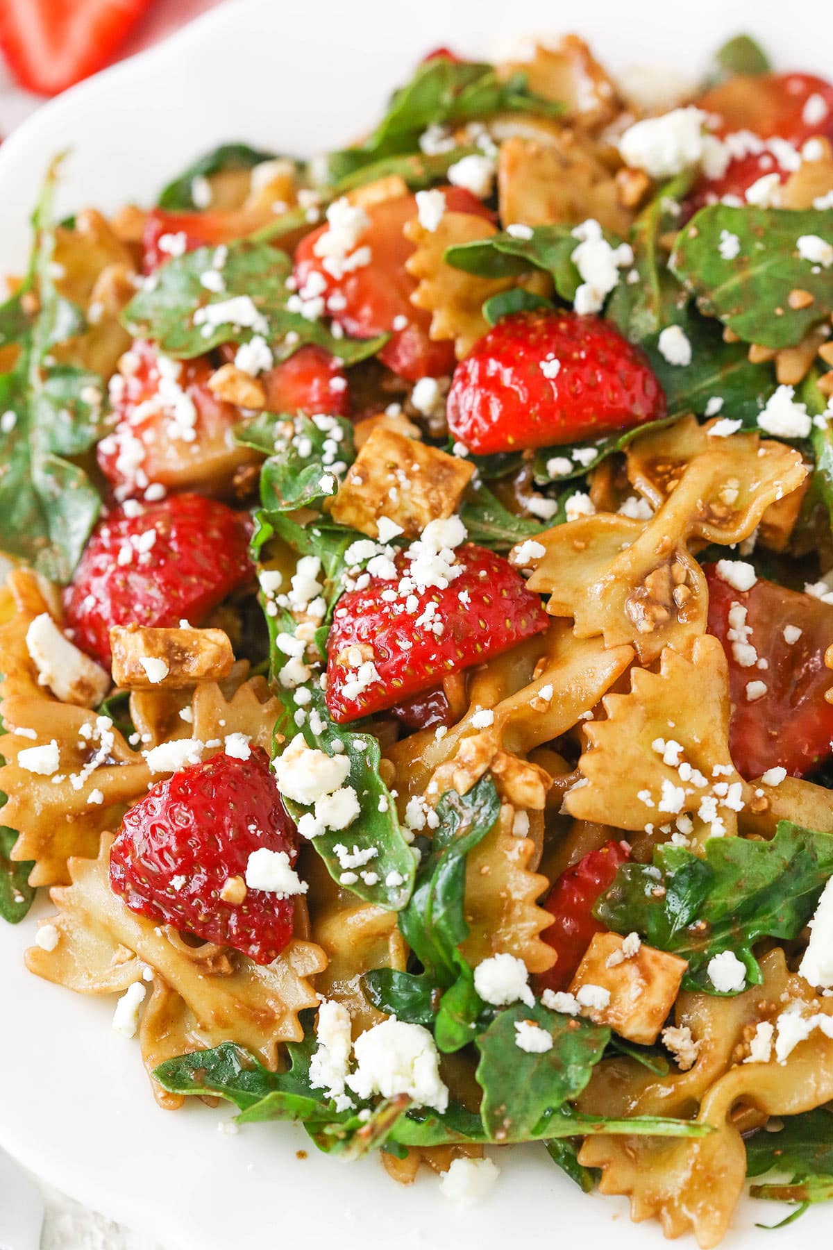 Strawberry Feta Balsamic Pasta Salad on a white plate