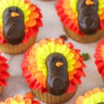 angled close up of turkey cupcakes on marble countertop