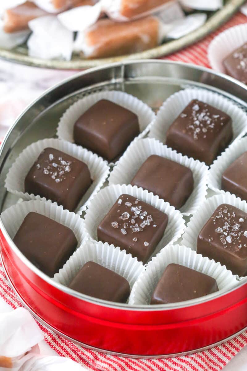 chocolate covered caramels in a red tin