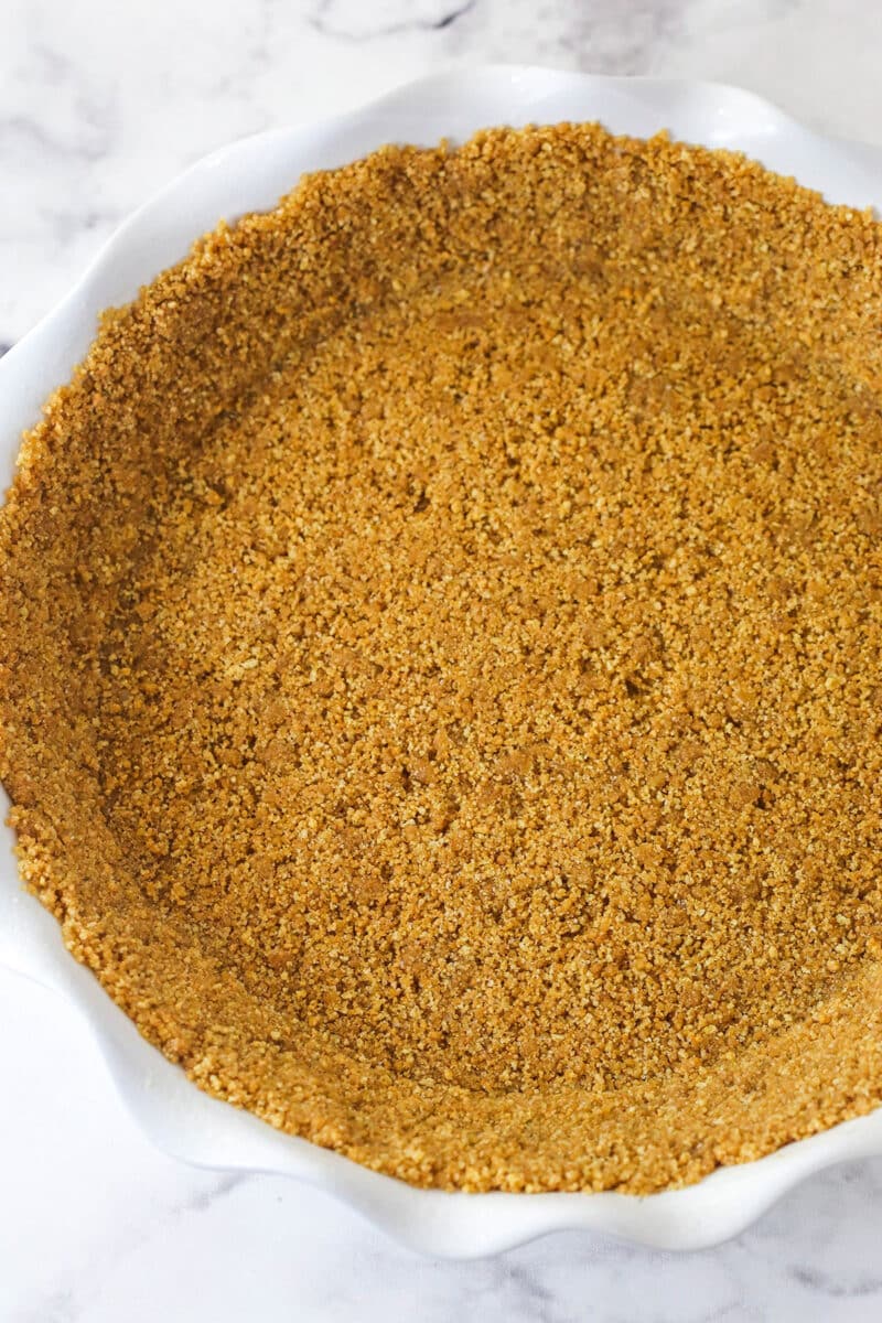 Graham cracker crust pressed into a pie pan