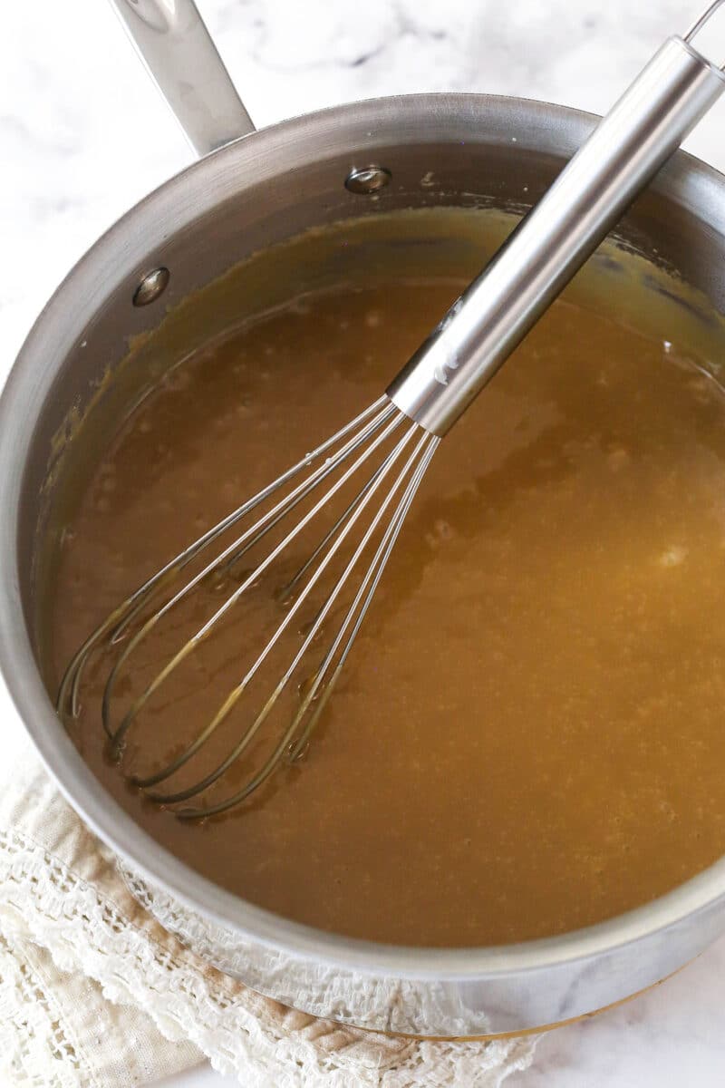 Whisking toffee in a pot