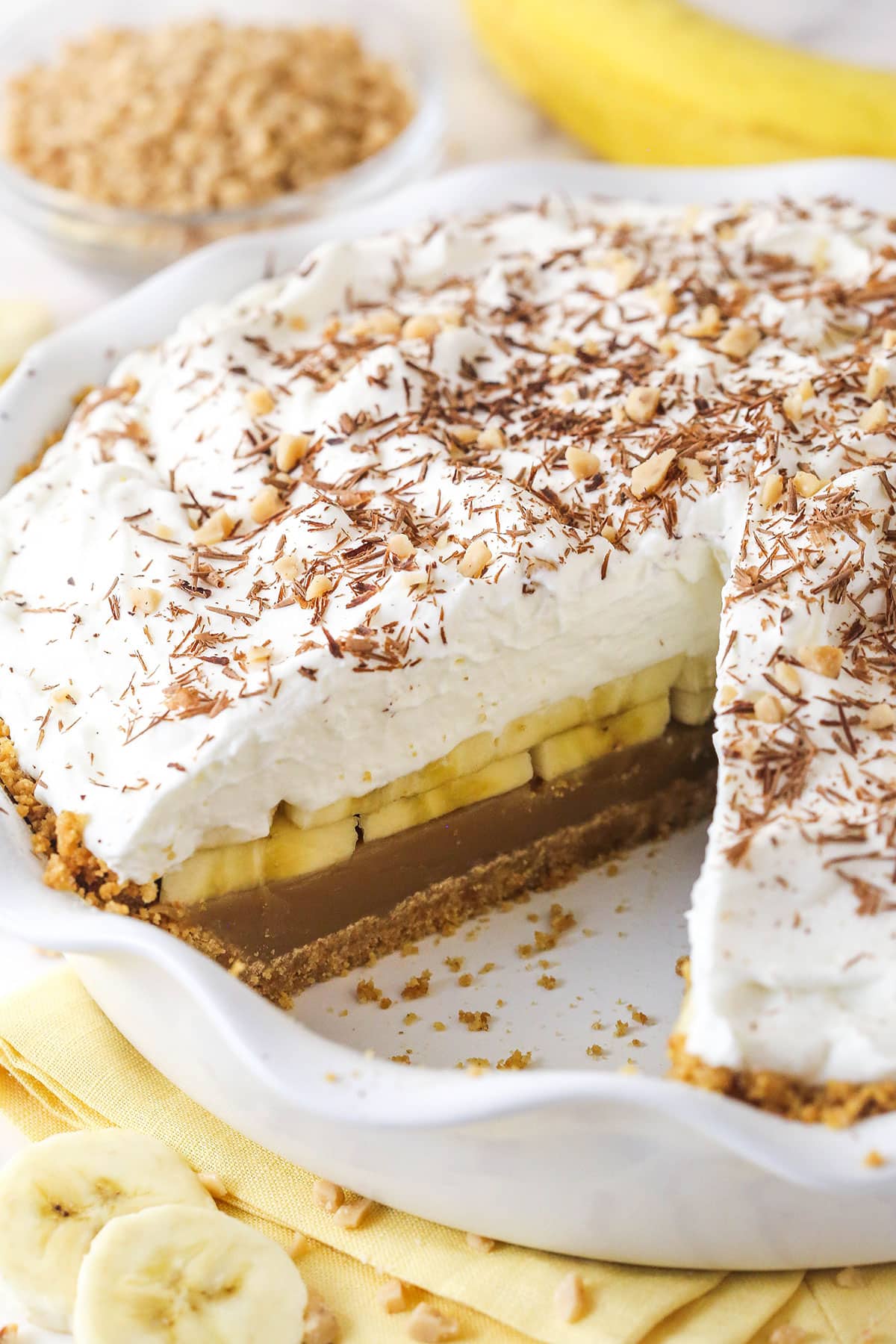 A banoffee pie with a slice missing