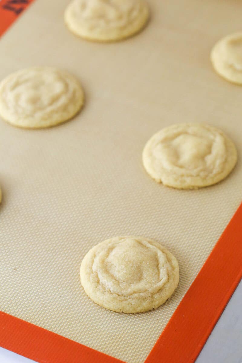 Baked sugar cookies on a baking sheet