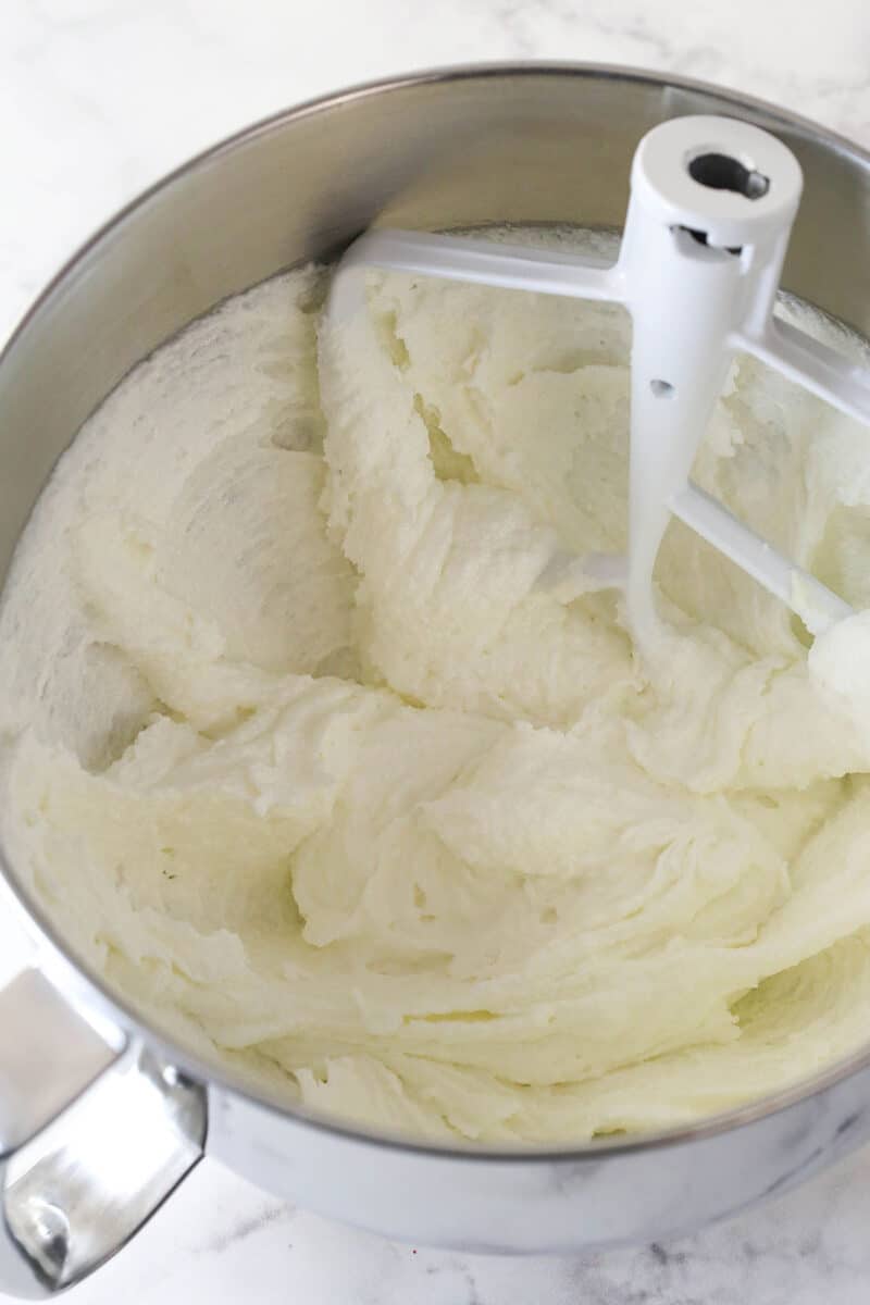 Creamed butter, oil, and sugar in a mixing bowl.