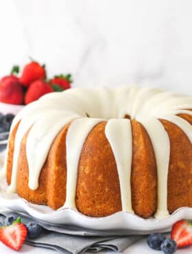 A vanilla bundt cake topped with vanilla icing