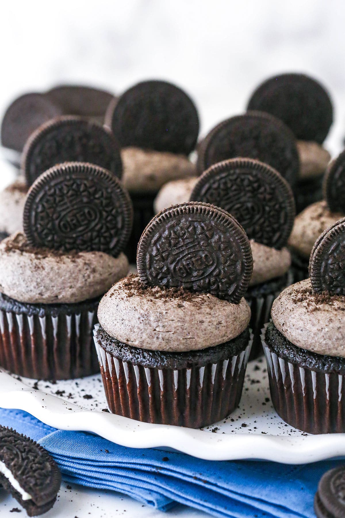 Oreo cupcakes on a serving platter.